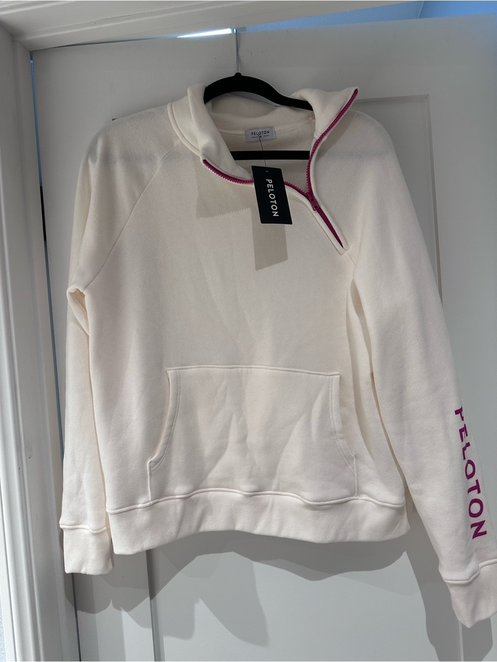 Peloton Cream Half-Zip Hoodie with Pink Trim
